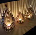 The Auren                                                                    Sculptural wooden candle holders